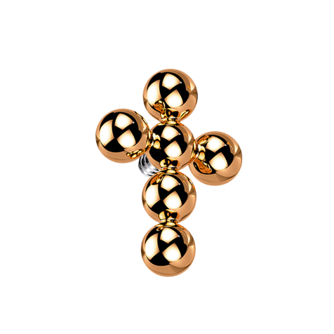 Ancrage cutané en or rose avec croix et boules