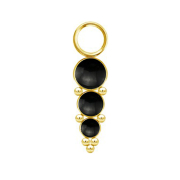 Gold-plated pendant with three black onyx stones and spheres