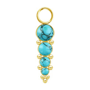 Gold-plated pendant with four turquoise stones and spheres