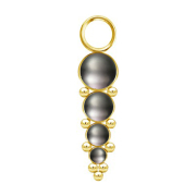 Pendentif doré quatre perles noires avec boules