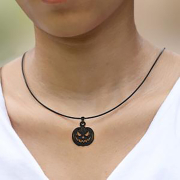 Black necklace with black pumpkin-head pendant