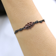 Black Celtic knot bracelet made of narra wood