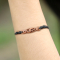 Bracelet noir « Vague et dauphin » en bois de sawo