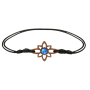 Black bracelet with a flower and a blue opal made of sawo...