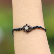 Black Mandala bracelet with white opal, made of Narra wood