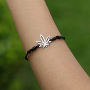Black bracelet with silver hemp leaf pendant