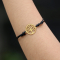Black bracelet with gold-plated Tree of Life pendant