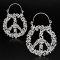Boucle doreille en argent avec des fleurs et le symbole de la paix